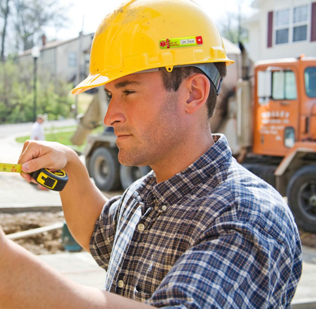 Worker with tape vital id medical alert